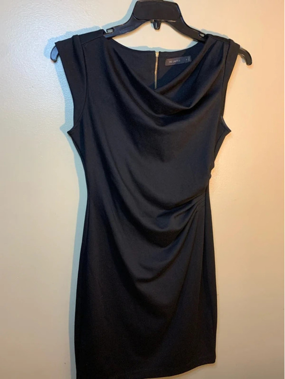 The limited black scale neck sleeveless sheath dress